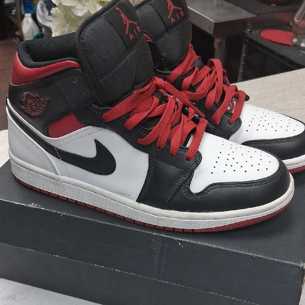 Nike Air Jordan Black, Red, and White High Tops